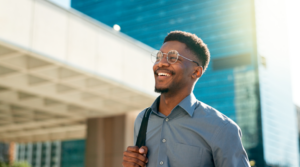 Person smiling and walking into work.