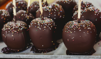 Chocolate-Dipped Apples with sprinkles.