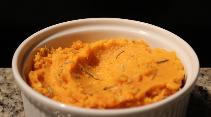 These mashed sweet potatoes incorporate rosemary for a splash of color.