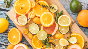 Plate of fruit that is sliced up and ready to be served.