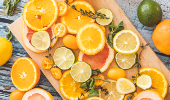 Plate of fruit that is sliced up and ready to be served.