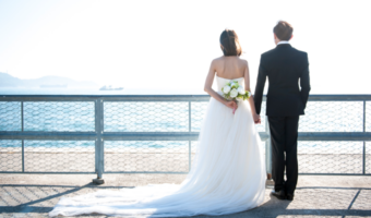 Couple getting married on the water.