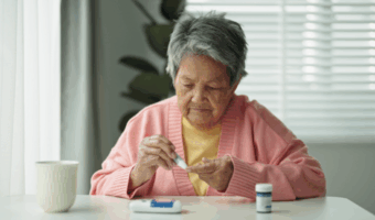 Person checking their blood sugar.