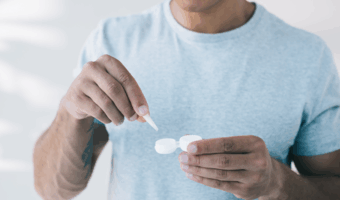 Person getting ready to put in contacts.